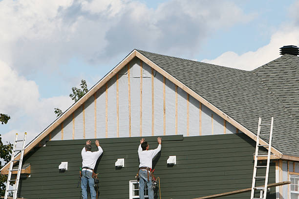 Professional Siding Installation technician working in Cold Spring Harbor, NY
